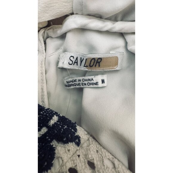 Saylor Ivory & Navy M Lace Embroidered Romper Open Back & Ribbon Tie Detail - Picture 3 of 15